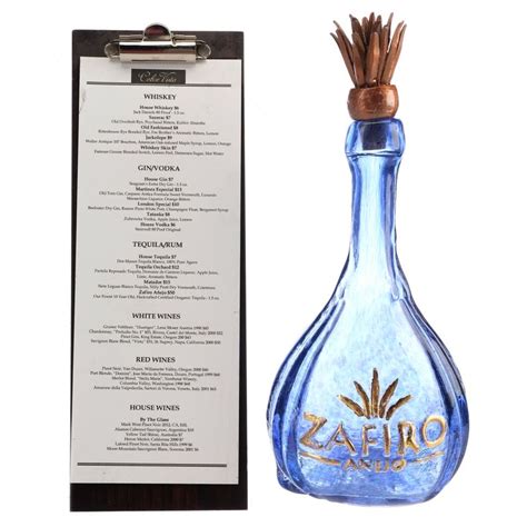 Tequila should be bought within your financial means so look for a price point that does not break the bank. . Zafiro aejo tequila blue bottle